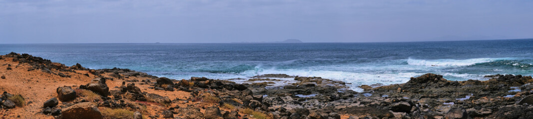 panorama picture of the rocky coast of Playa Blanca, Lanzarote