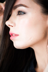 Close up portrait of beautiful young brunette woman 