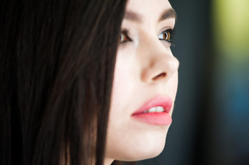 Close up portrait of beautiful young brunette woman 