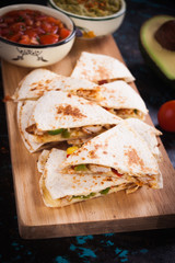 Mexican quesadilla, tortilla filled with cheese, meat and vegetables