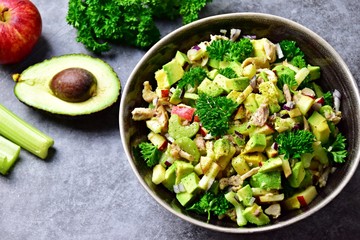 Avocado, apple and chicken salad. Paleo and keto diet healthy dish