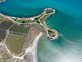 Great view at the lake Ontario from the cliff park aerial. Sunny day green crystal calm water....