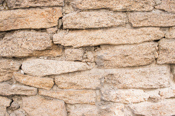 masonry wall of their granite stone