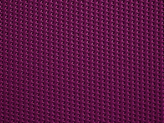 Close-up of purple fabric plastic textile lattice grid texture. Horizontal and vertical crossover lines. A lattice work of interwoven purple plastic textile textured strips forms a pattern background