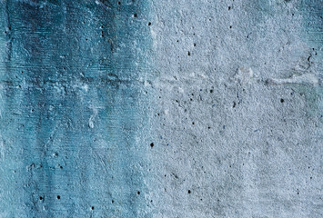 Grey and blue abstract textured grunge wall background   for use in design. Wall fragment with cracks, scratches 