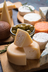 Aged cheese round and slices