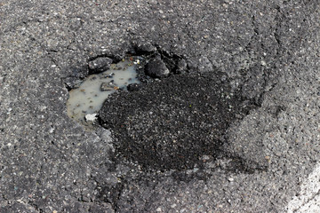 Street road asphalt pothole cracked fracture fragments surface texture layer