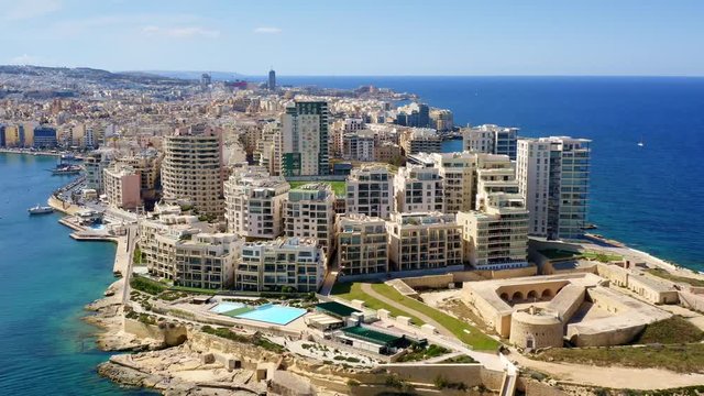 Aerial view of Sliema city. Tigne Point complex. Malta. Europe. 4k footage