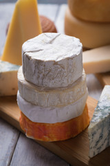 Aged cheese round and slices
