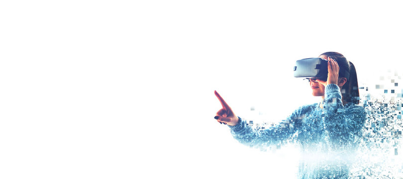 The woman with glasses of virtual reality. Future technology concept. Modern imaging technology. Fragmented by pixels. VR glasses.