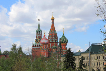 Fototapeta na wymiar St. Basil's Cathedral and the Kremlin Spasskaya tower on red square in Moscow Russia