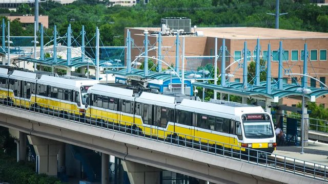 Time-lapse of a train pulling in and out of a station. 