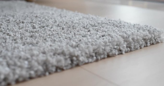 Grey carpet on the floor at home