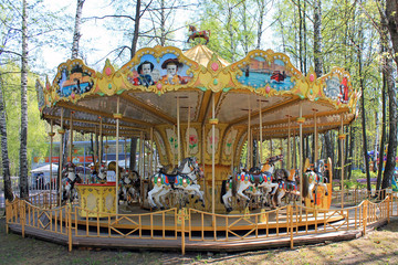 Multi-colored children's carousel retro style with horses