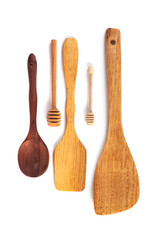 Various wooden kitchen tools isolated on white background