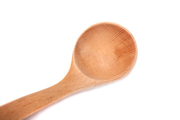 Wooden kitchen spoon isolated on white background