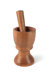 Wooden mortar (pounder) and pestle isolated on white