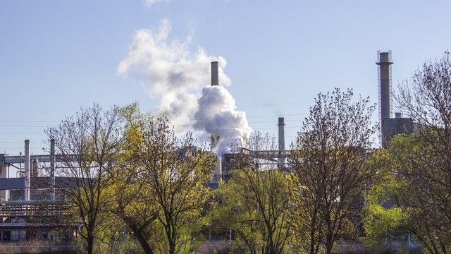 A Chimney Shrouded In A Cloud Of Smoke