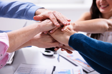 Group Of Businesspeople Stacking Hands