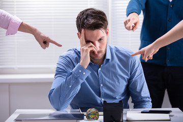 Hands Pointing Towards Businessman