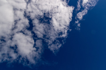 Clouds against blue sky as background