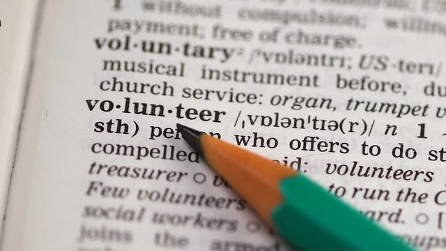 Volunteer word in english vocabulary, person offering charge free help, altruist