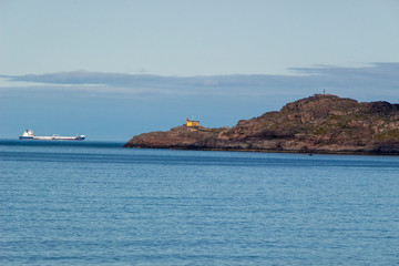 Beautiful aerial view on sea surface and rocky coast