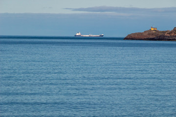 Beautiful aerial view on sea surface and rocky coast