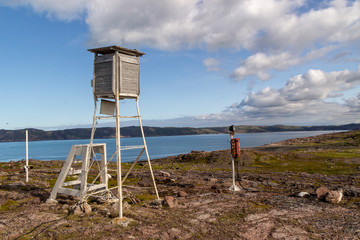 Weather station over the dam with mountain background