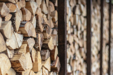 Background of wooden logs. Year rings. Pile wood. Deforestation theme. Wood industry. Chopped wood. Woodpile scene.