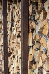 Background of wooden logs. Year rings. Pile wood. Deforestation theme. Wood industry. Chopped wood. Woodpile scene.