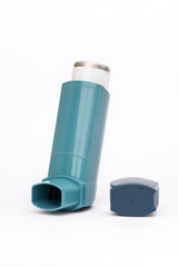 Portable asthma inhaler isolated on white background