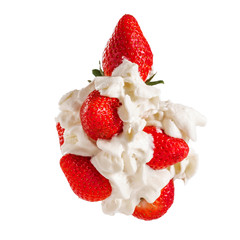 Red fresh strawberry berries in white milk cream closeup isolated on white background.