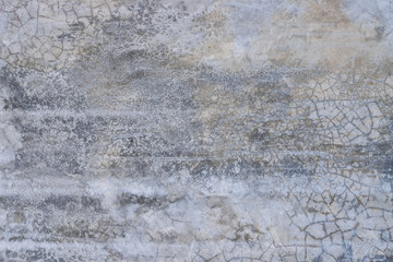 Grunge concrete wall with crack and stains in industrial building. Cement texture for design and background.