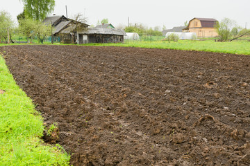 Dug up a field near the country house for planting vegetables or crops
