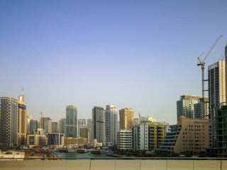 Fototapeta na wymiar Dubai Marina, a tourist attraction area with shops, restaurants and residential skyscrapers in Dubai, United Arab Emirates