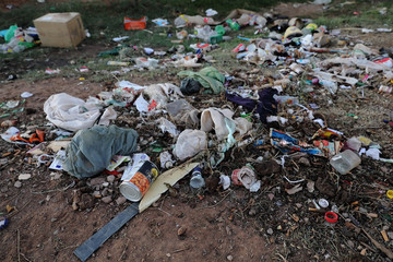 Filthy, dumped stuff next to the road