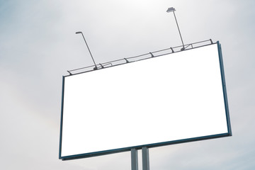 Billboard on the background of a beautiful white cloudy sky. Mock up for your advertising or announcements