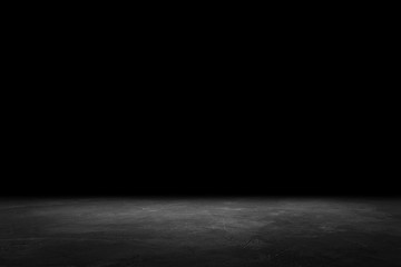 Asphalt surface, racetrack on a black background