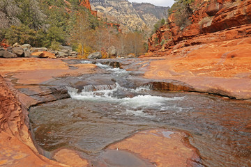Slide Rock Canyon State Park, Arizona is actually crowded  during the warm season and have many visitors. It's peaceful and tranquil here to soak in the scenery during the cold season.