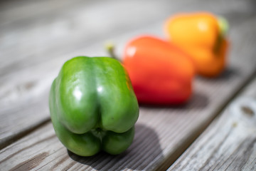 bell pappers on wooden board