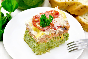 Casserole of salmon and rice on board