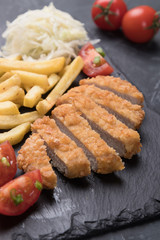 Breaded cutlet with french fries