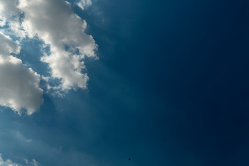 Beautiful blue sky with patchy white cloud on tropical weather in summer time background pattern. Skyscape background