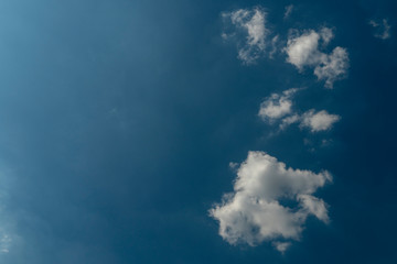 Fototapeta premium Beautiful blue sky with patchy white cloud on tropical weather in summer time background pattern. Skyscape background