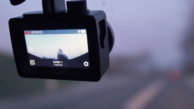 Dashcam Recording Road in Front of Driving Vehicle in the Evening