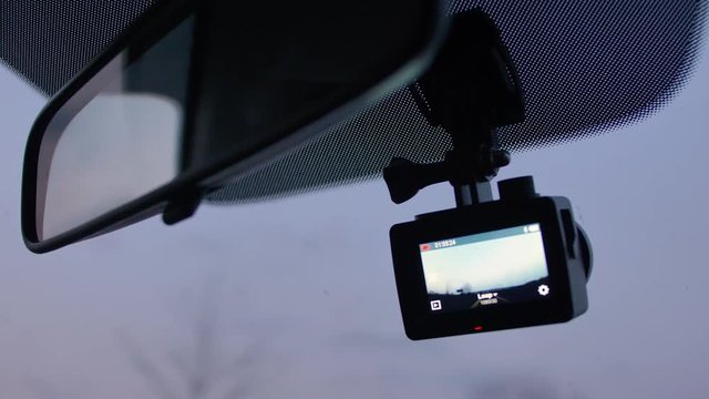 Dashcam Recording Road in Front of Driving Vehicle in the Evening