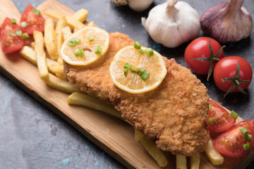 Breaded cutlet with french fries