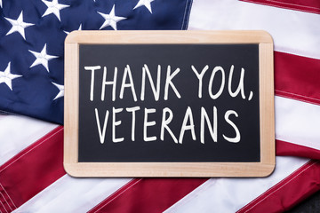 Fototapeta na wymiar Thank You Veterans Text Written On Slate