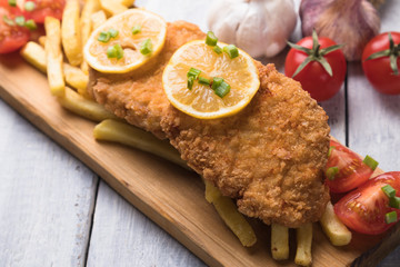 Breaded cutlet with french fries